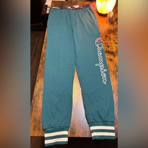 Never worn Men’s Champion Dark Green joggers.
